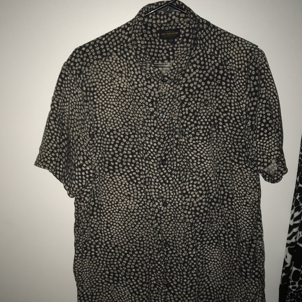 A large button-up t-shirt.